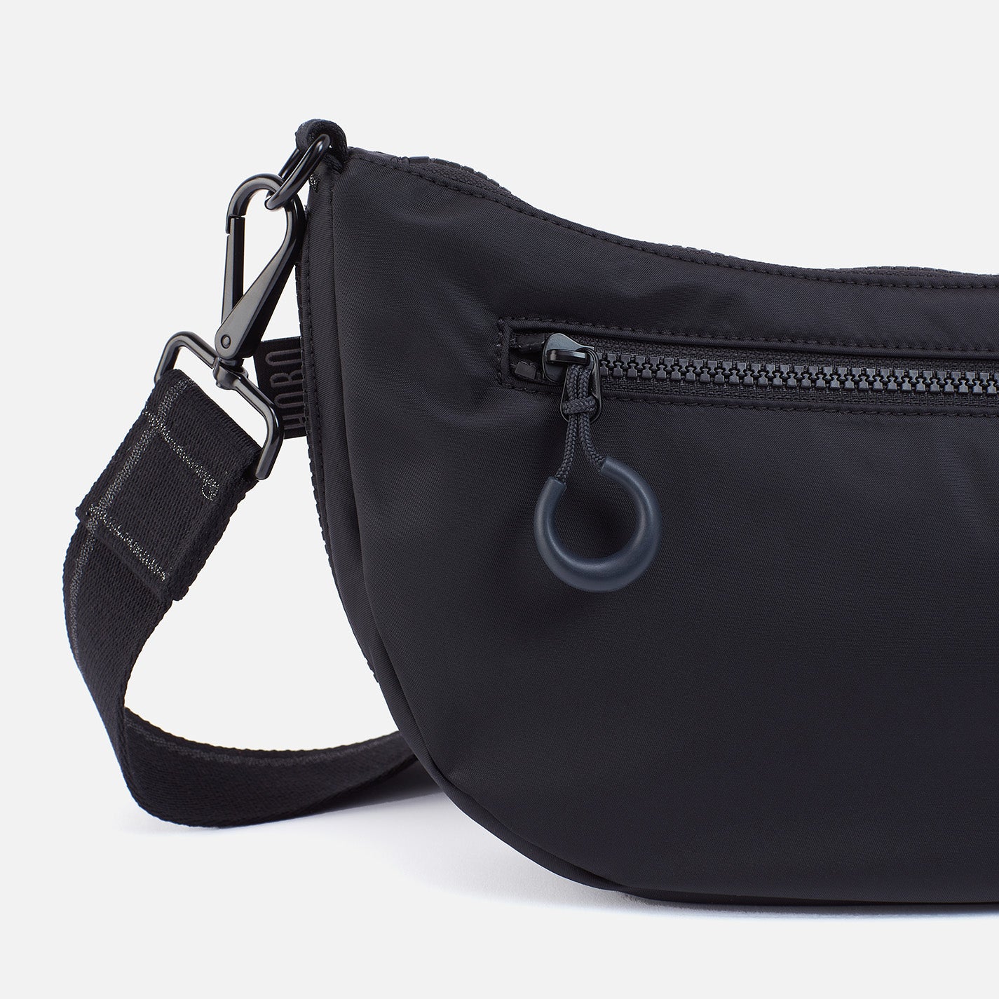 EVERY WEAR Crossbody in CaRefiber recycled nylon - Jet - Image 9